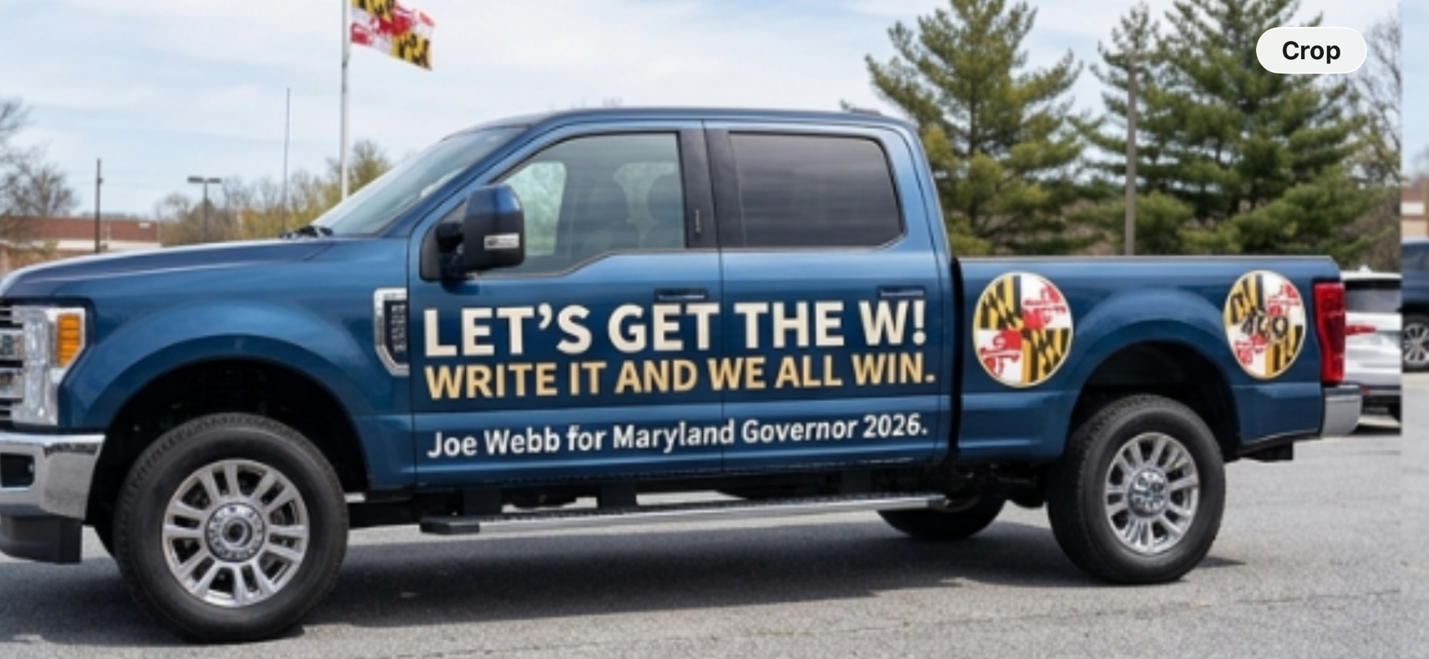 Blue pickup truck lettered: Let's get the W! Write it and we all win. Joe Webb for Maryland Governor 2026.